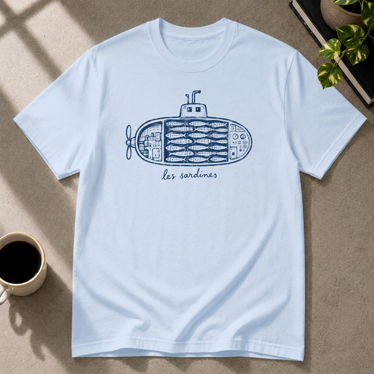 Sardine graphic T-shirt on light blue tee by Butter & Tonic