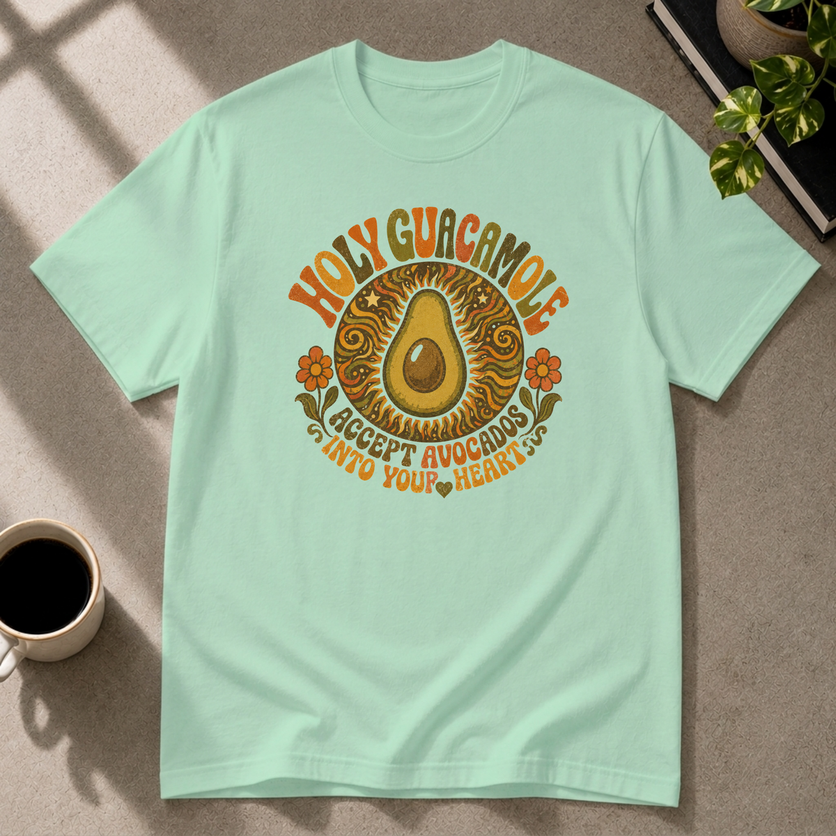 Avocado guacamole graphic T-shirt on mint green tee by Butter & Tonic