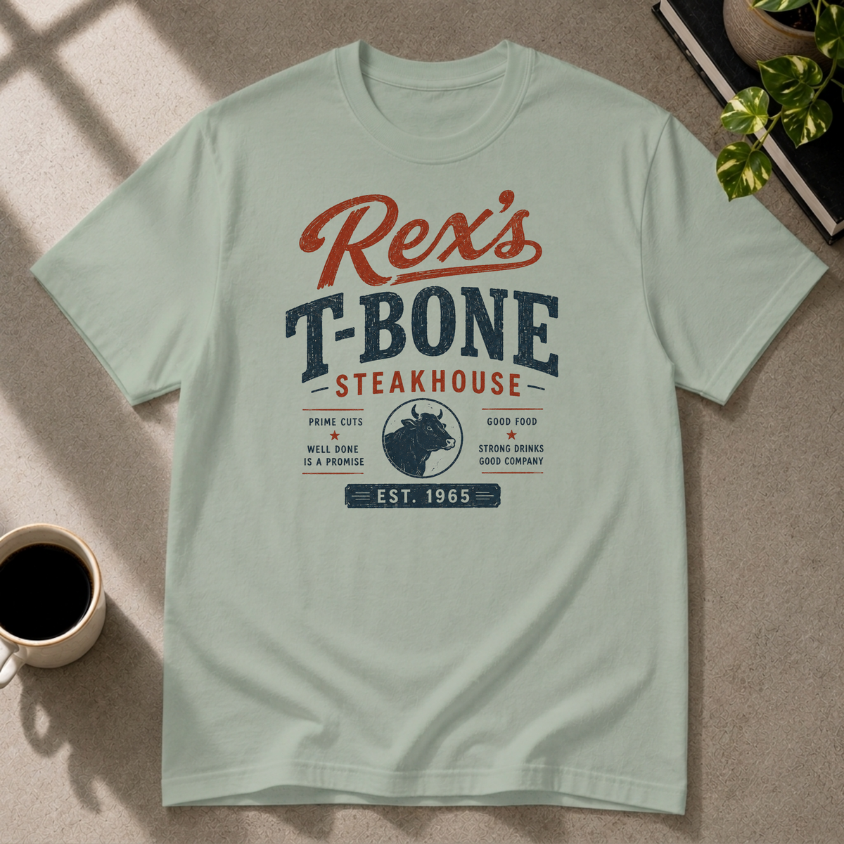 Steakhouse graphic T-shirt on light blue tee by Butter & Tonic